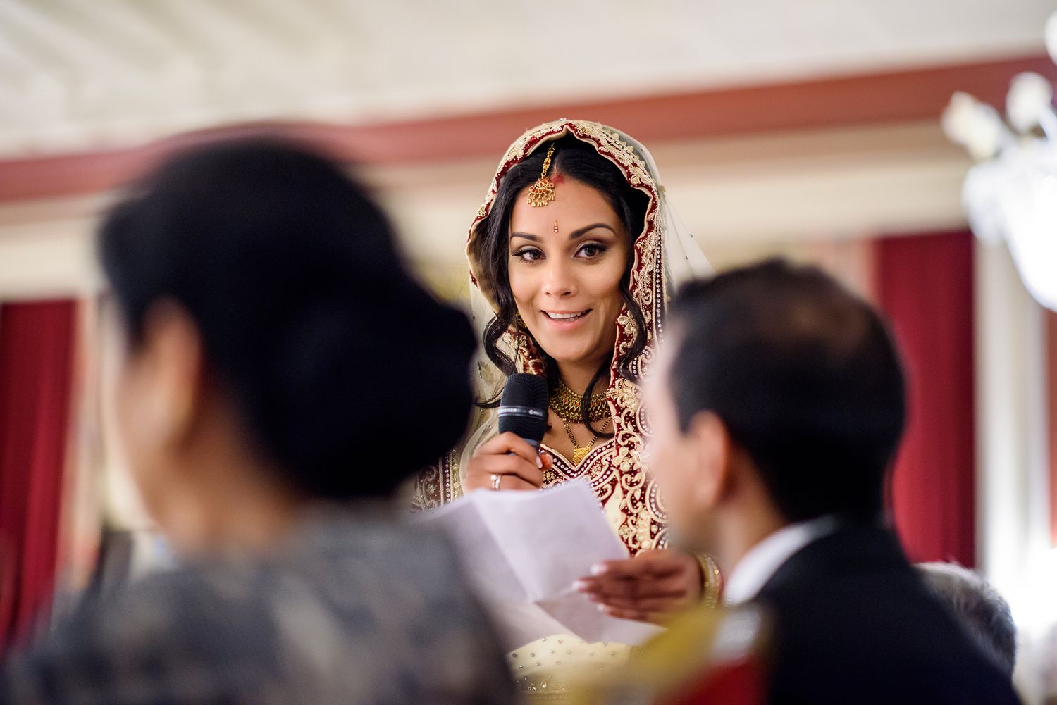 Candid moments of celebration captured during formal wedding reception.