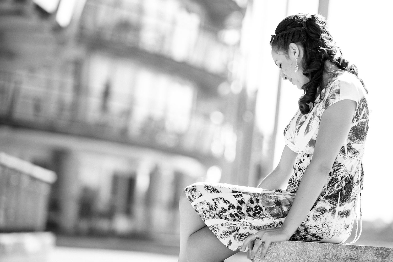 Soft focus engagement portrait with natural window lighting.