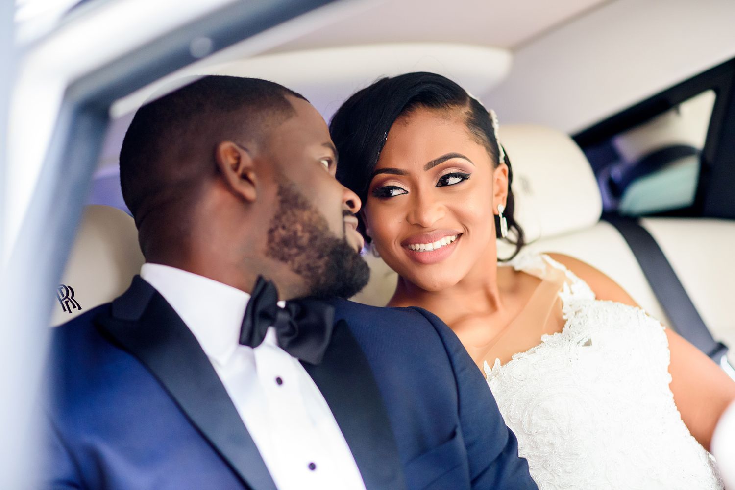 Romantic moments captured in wedding car portraits.