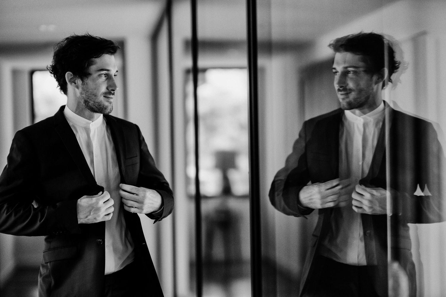 Black and white sequence showing playful expressions and laughter in formal attire.