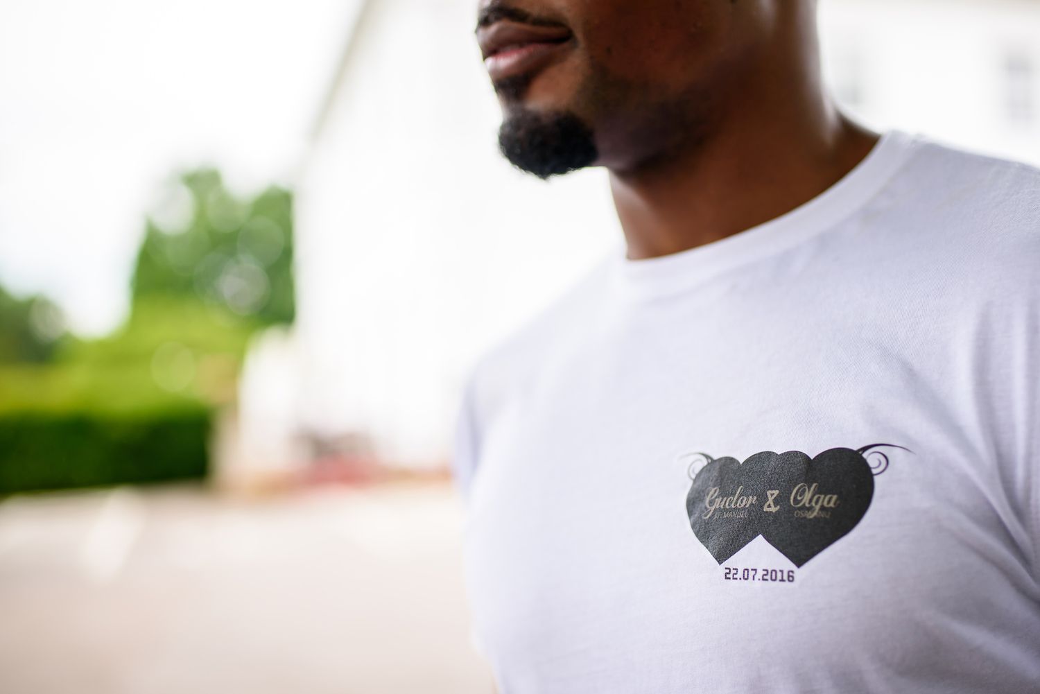 Close-up exterior shots of people wearing white t-shirts in natural daylight.