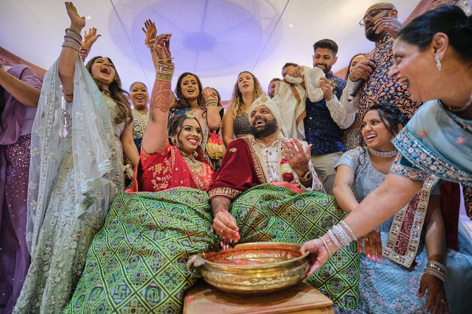 Group participating in traditional Indian wedding rituals and customs.