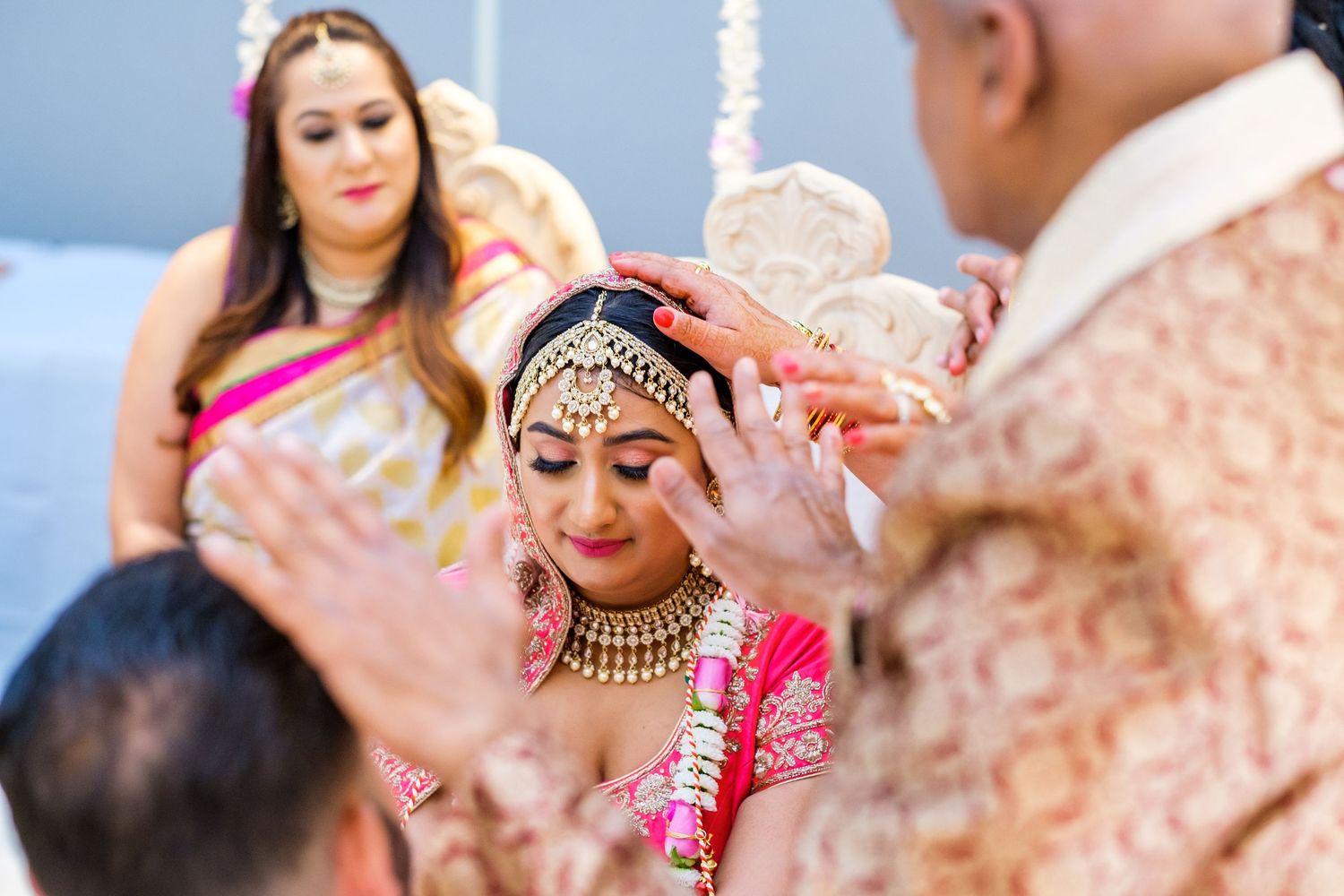 Traditional Indian wedding ceremony with decorative elements and cultural attire.