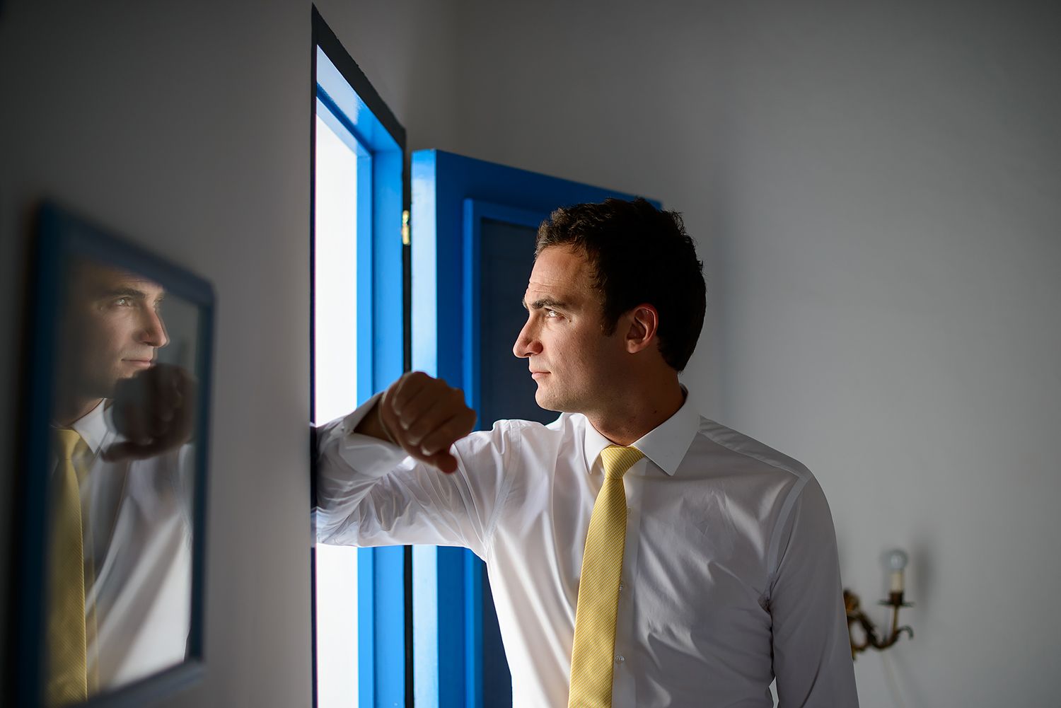 Interior scene with dramatic window lighting and yellow accents.
