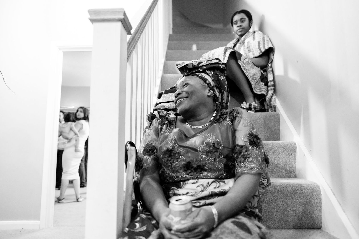 Black and white photographs showing quiet moments during wedding day preparations.