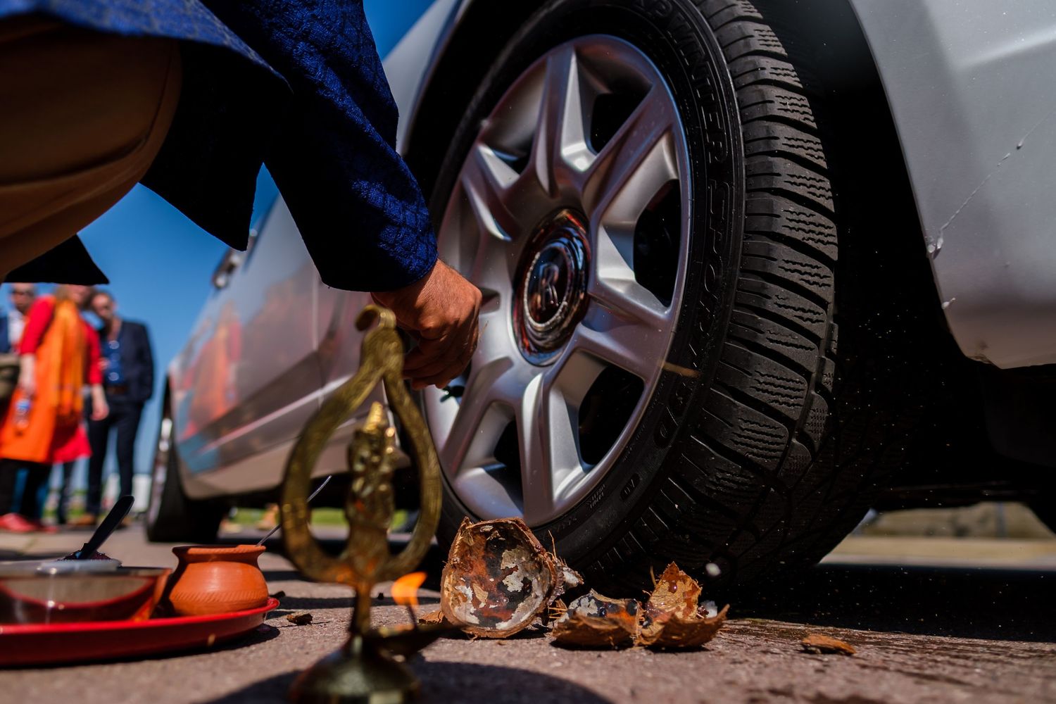 Close-up shots of car tires and wheels during a maintenance or repair service.