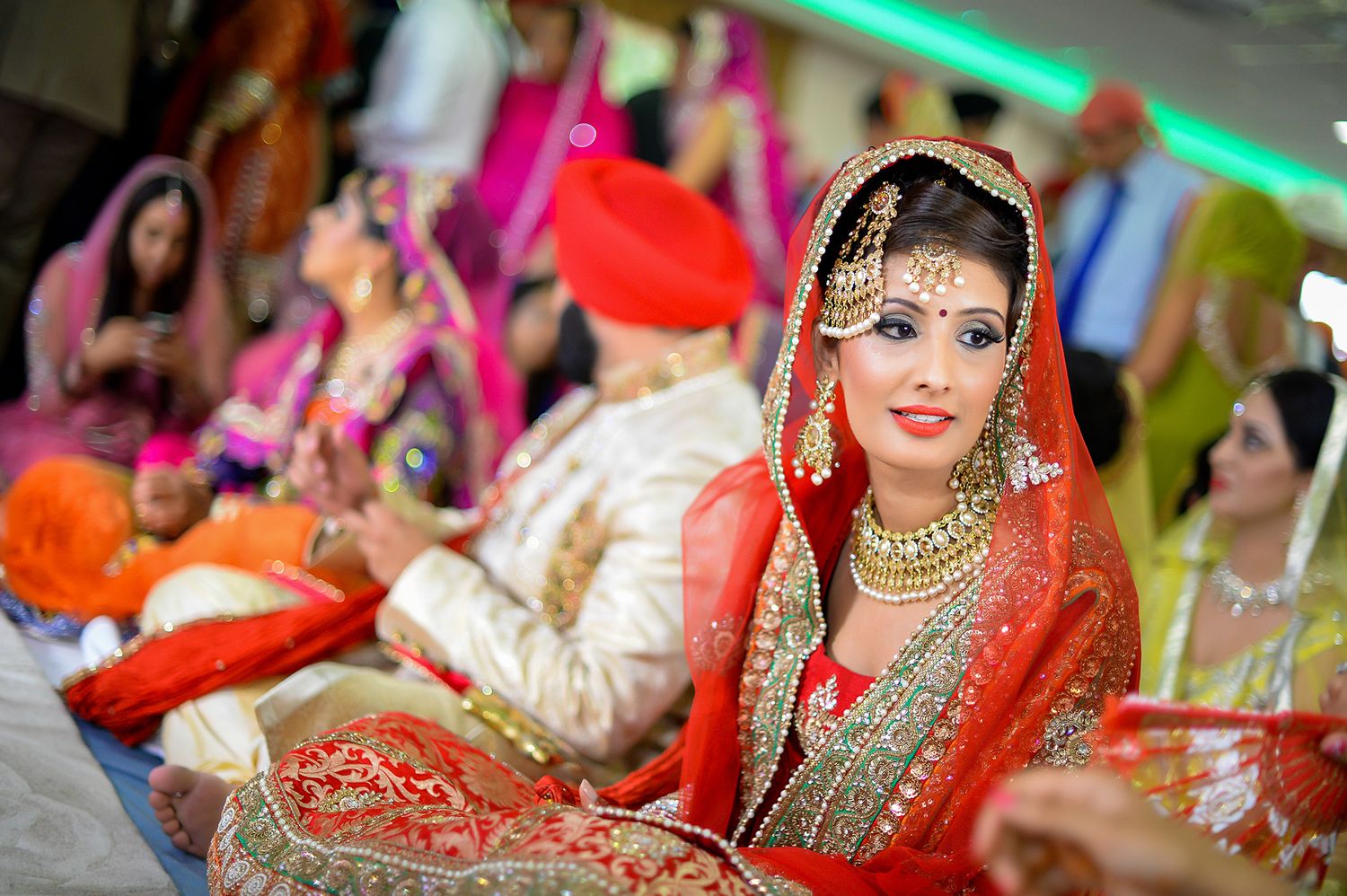 Traditional Indian wedding celebration with colorful decorations and festive attire.