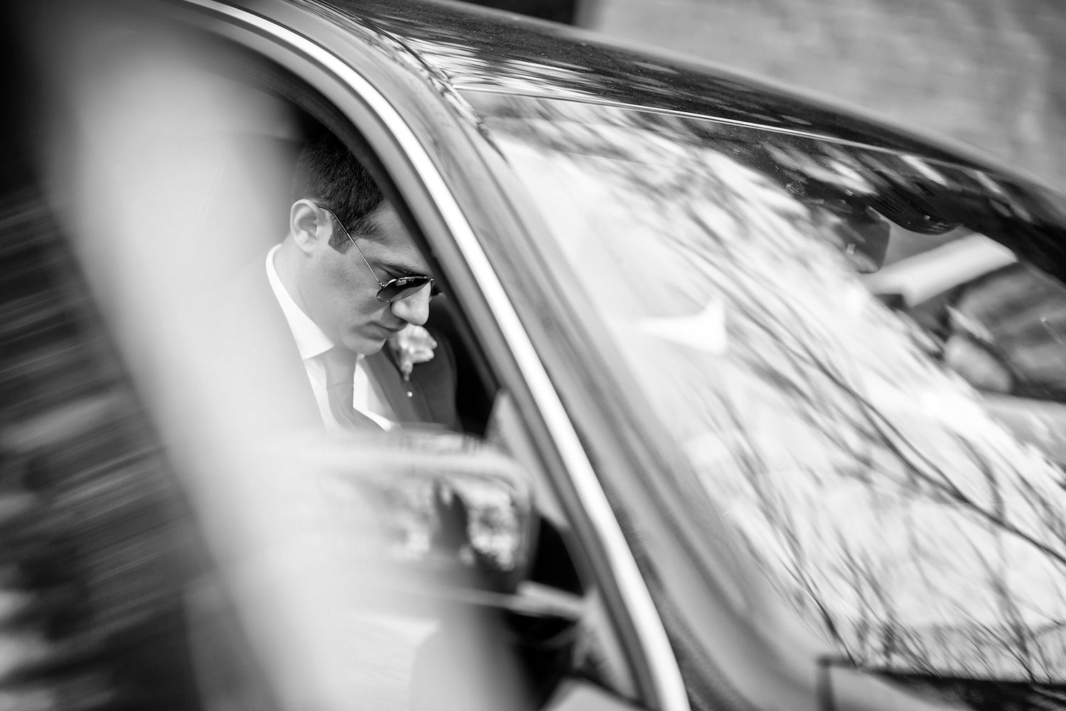 Abstract motion-blur shots of a wedding car arrival sequence.