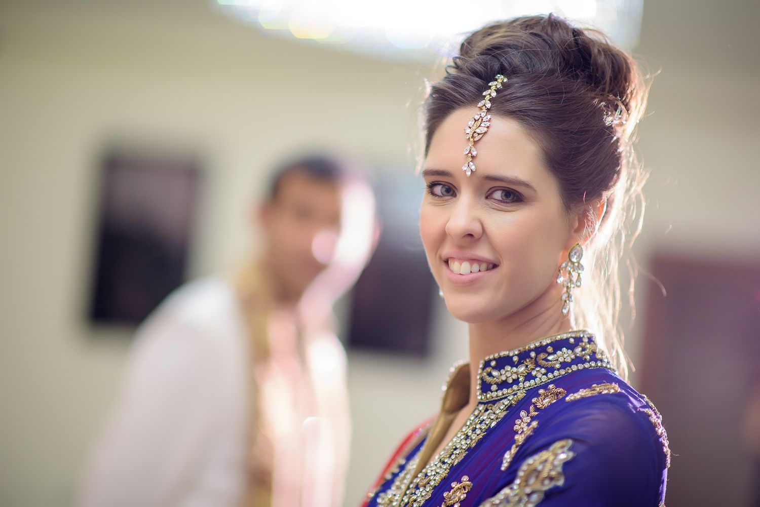 Candid moments capture joy and laughter during an Indian wedding celebration.