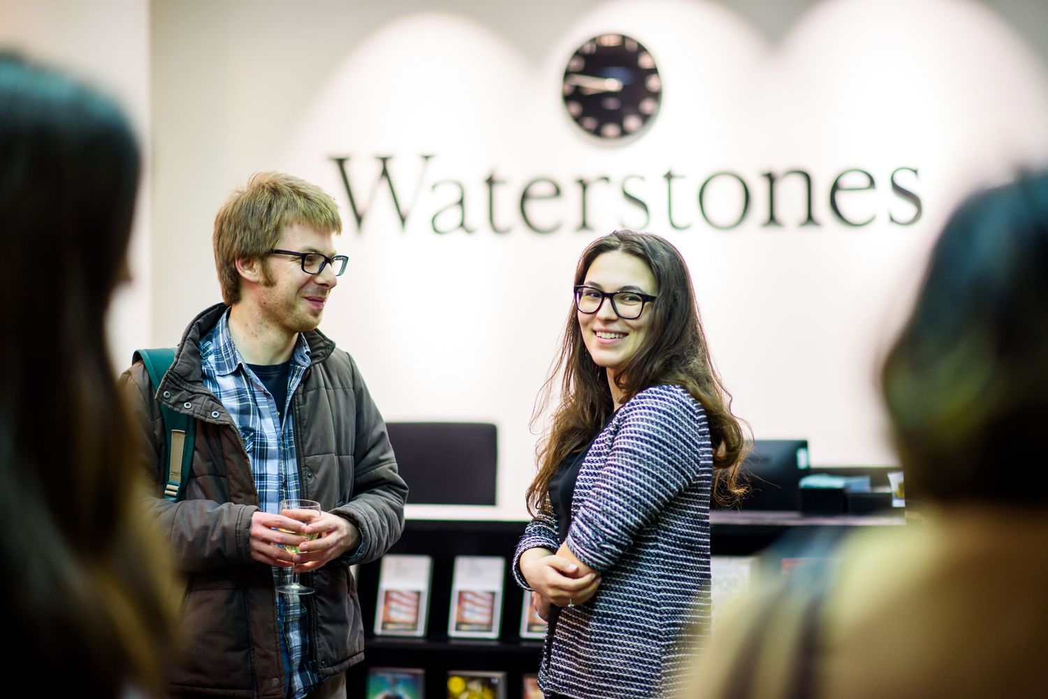 Students gathered at a casual meetup inside a Waterstones bookstore location.