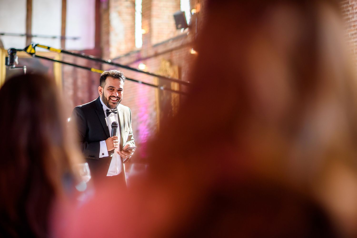 Artistic blur effect capturing wedding reception atmosphere with selective focus.