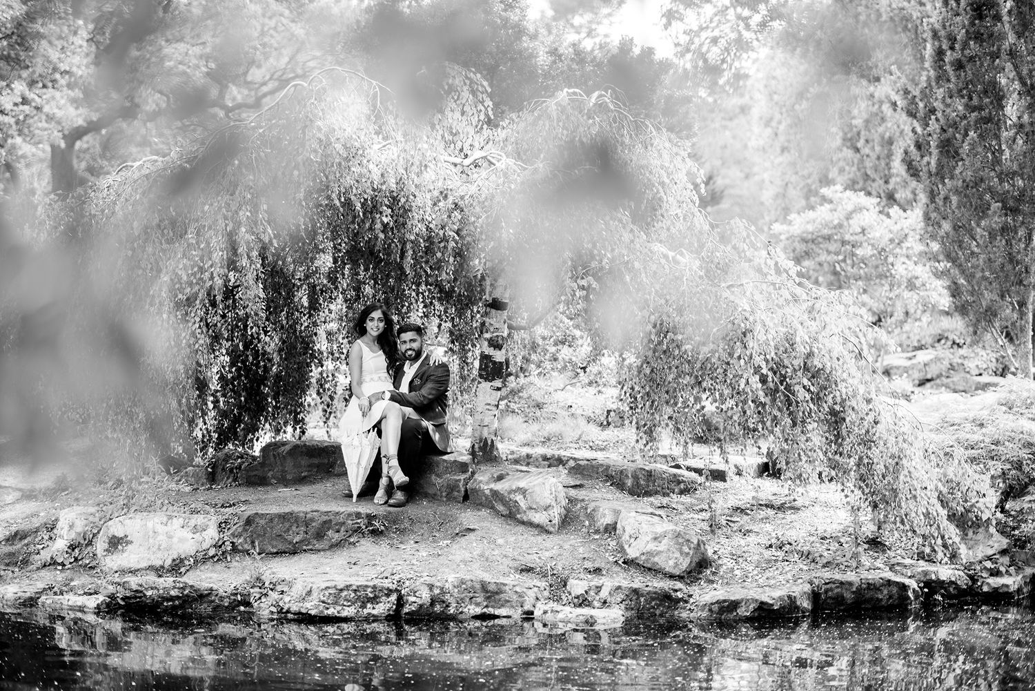 Double exposure wedding photos creating a dreamy black and white sequence in nature.