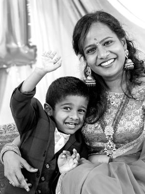 Candid black and white portraits capturing happy family moments.