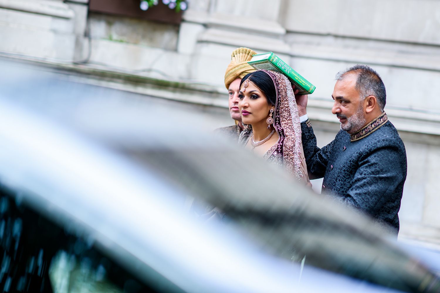 Artistic wedding portrait shots through reflective surfaces and creative angles.