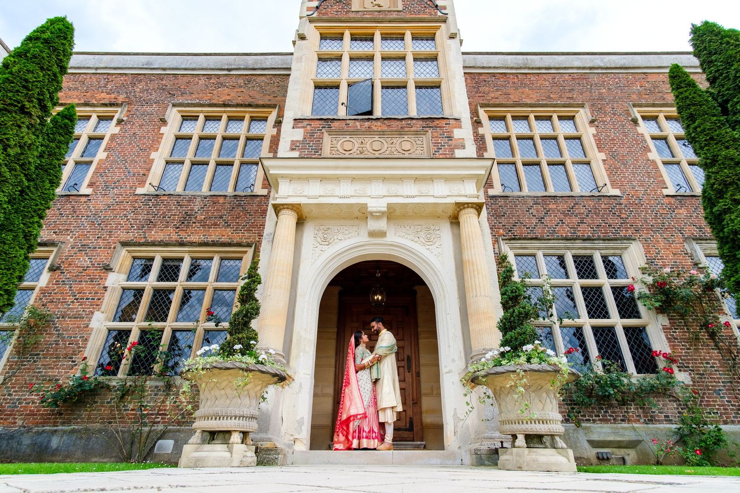 Historic brick building facade with ornate windows and architectural details.
