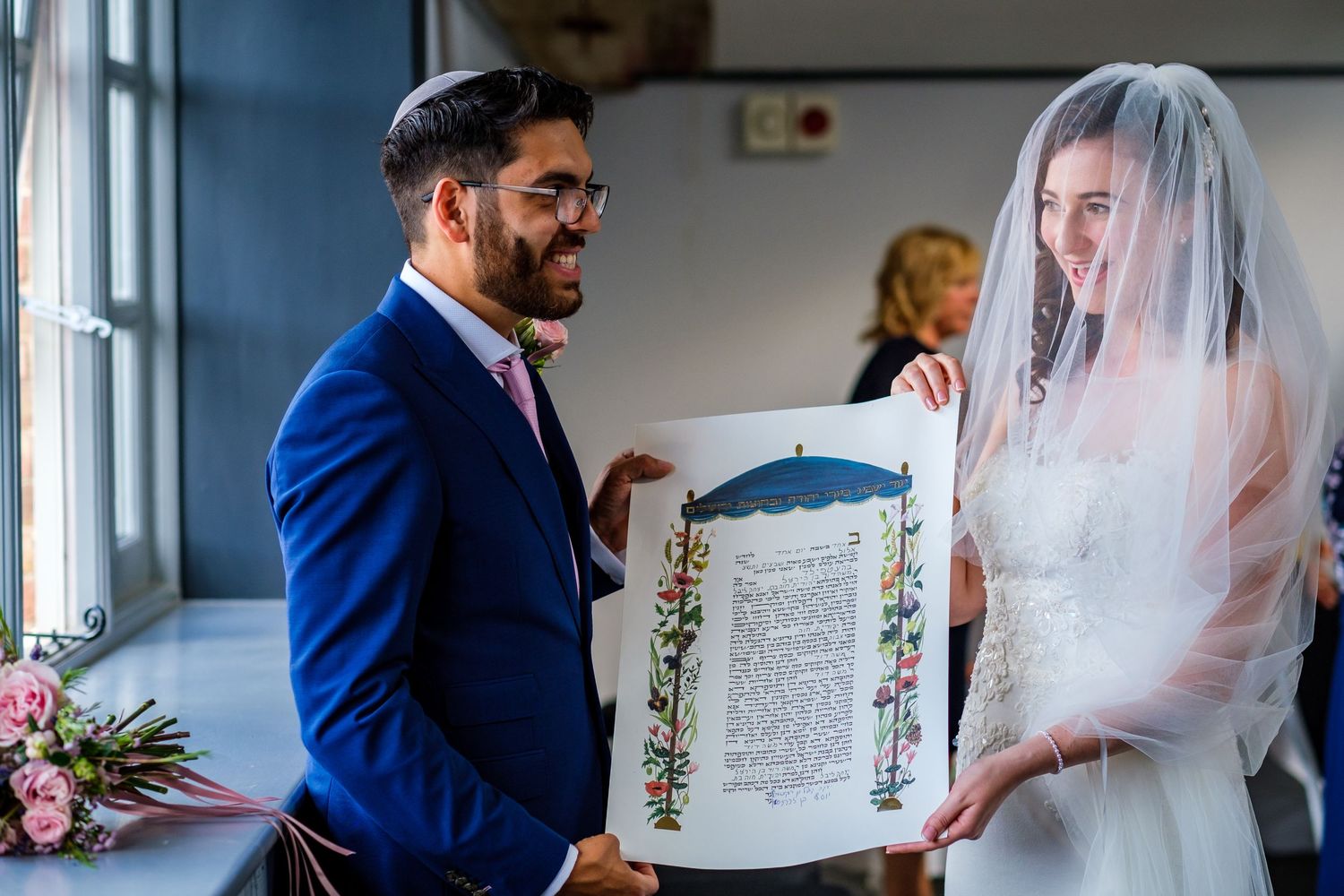 Wedding ceremony in a bright church with sunlight streaming through stained glass windows.