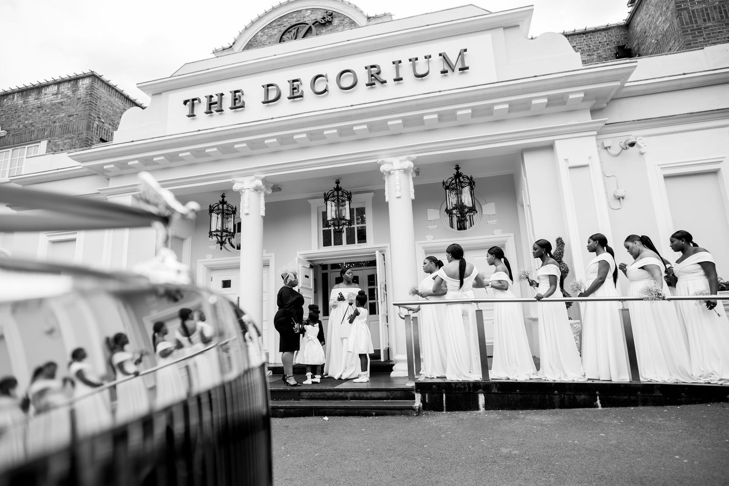 Exterior view of The Decoking venue building with classic white architecture.