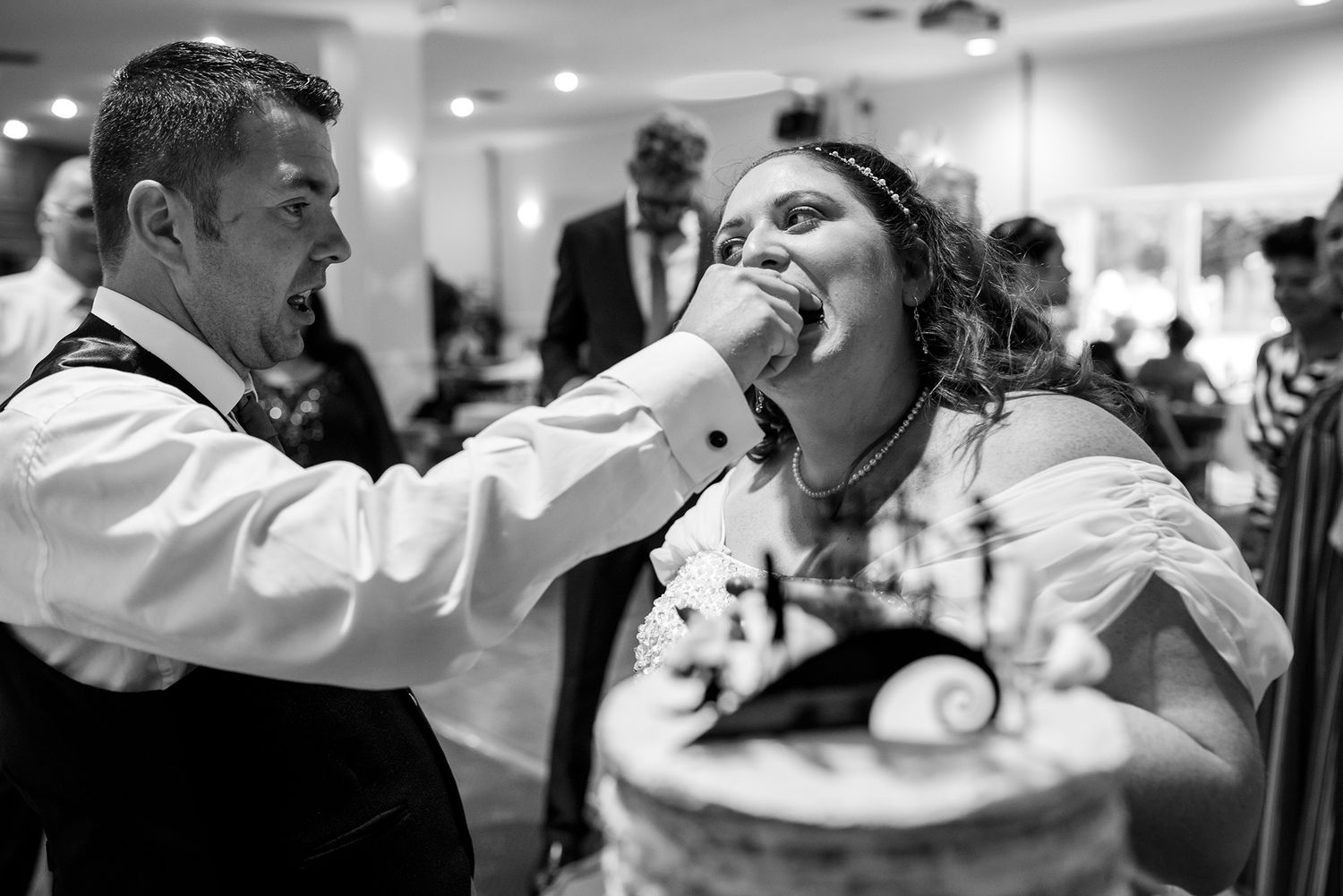 Black and white photos showing wedding reception dance floor celebrations.