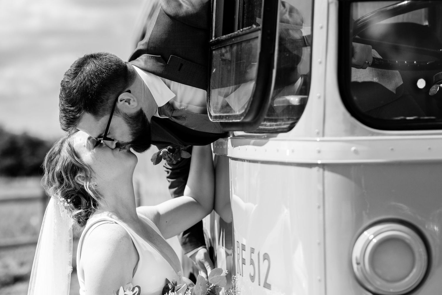 A black and white photo montage showing various close-up shots of people in cars and vehicles.