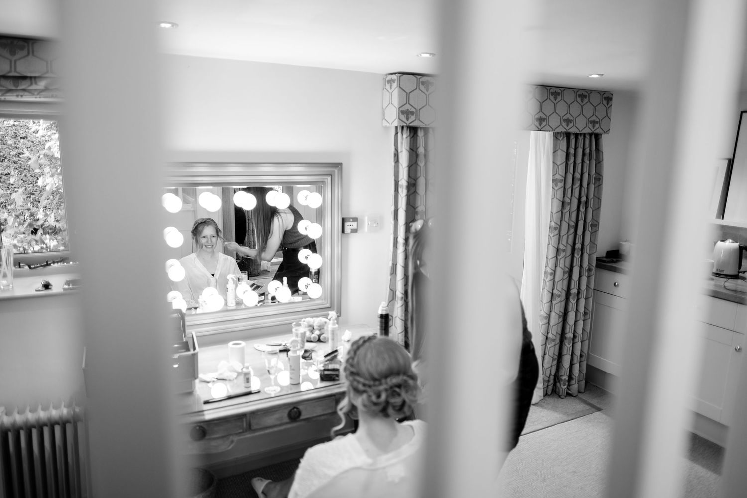 A series of black and white photographs showing the interior of a medical facility or hospital room.