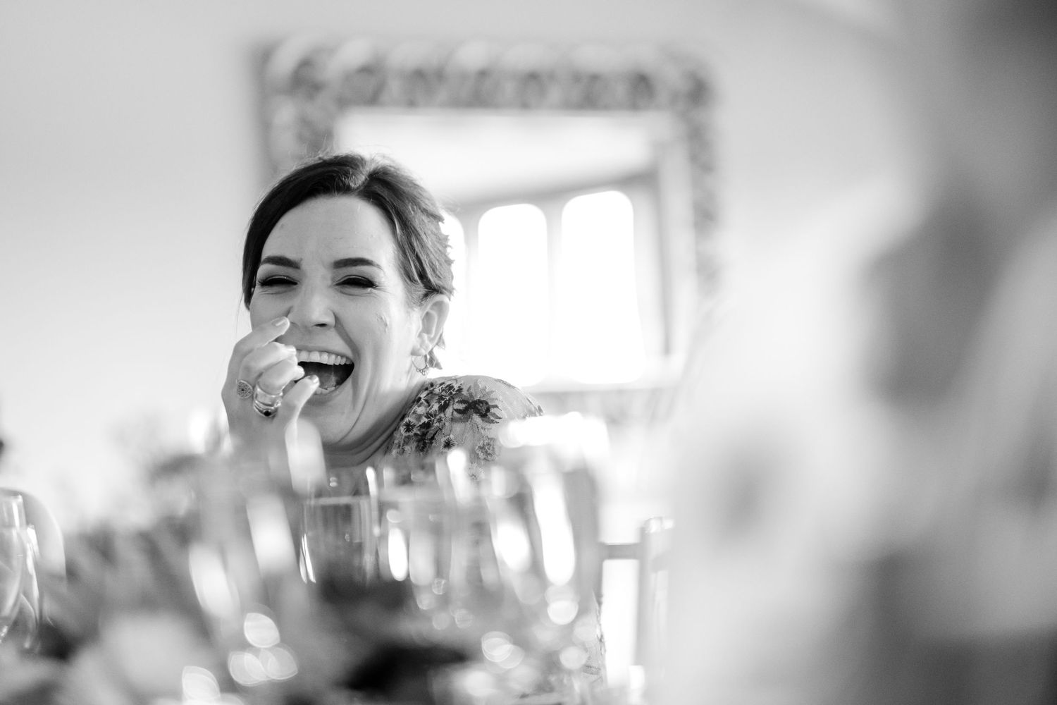 Emotional black and white wedding celebration moments captured during the reception.