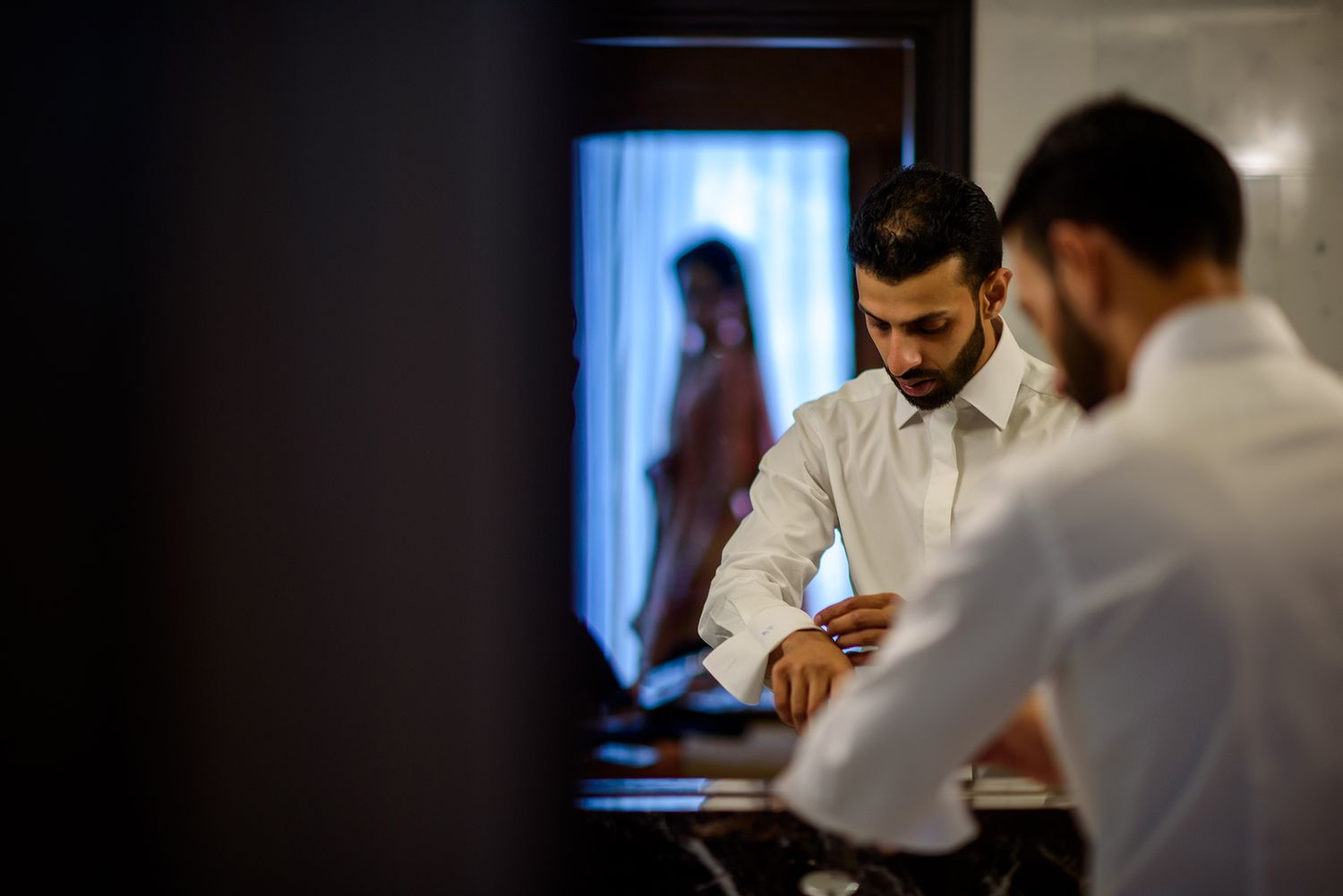 Getting ready scene with formal attire and morning preparations.
