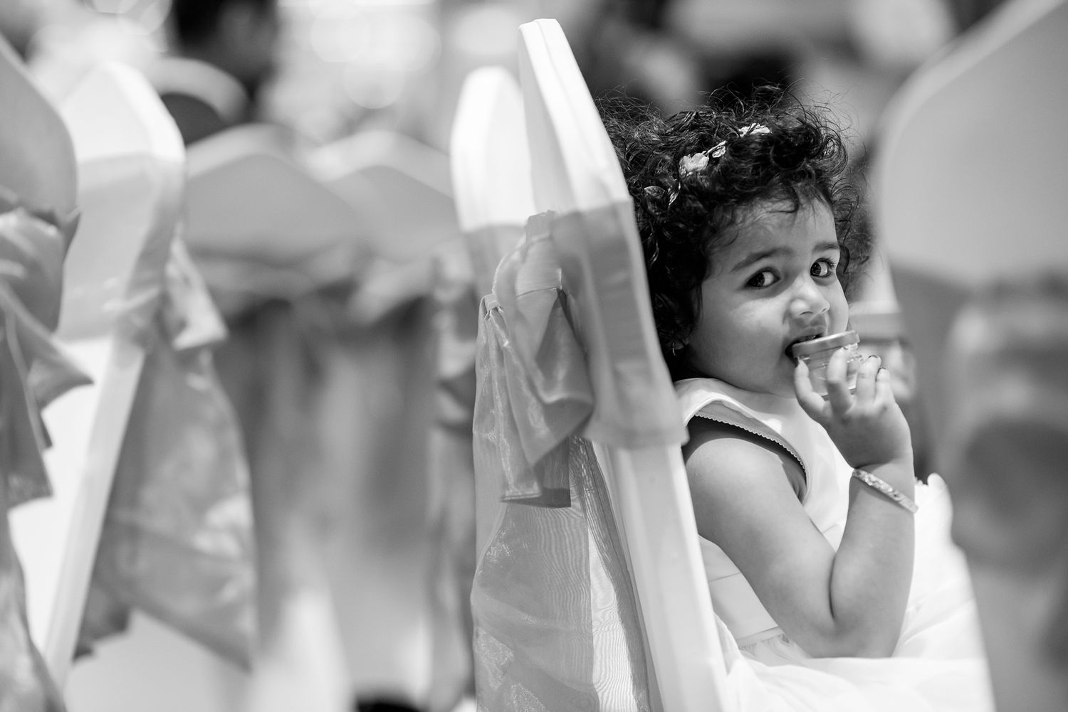 Black and white emotional moments captured during a wedding ceremony.
