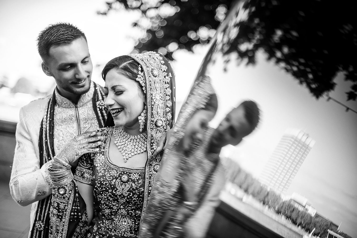 Black and white candid wedding portraits showing intimate moments between couple.