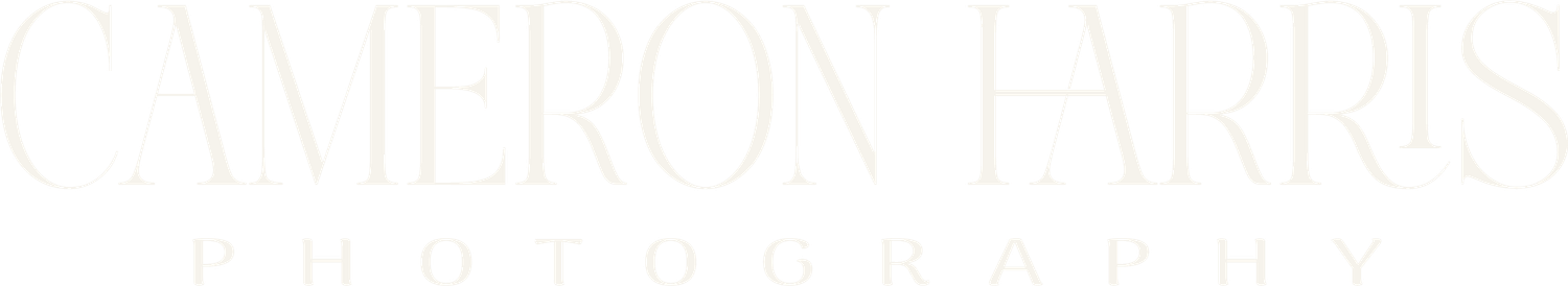 Cameron Harris Photography logo in elegant white text on light background.