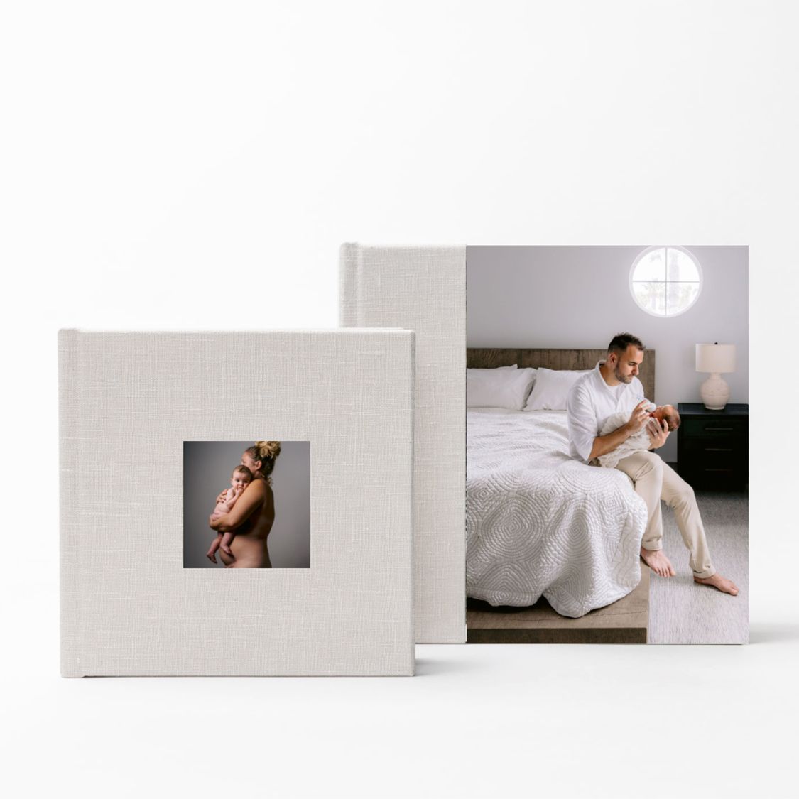 A bride in an ethereal white wedding dress sits gracefully in an elegant contemporary minimalist setting.