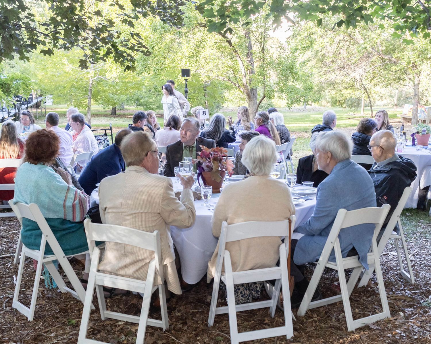 People sitting around a table at an event