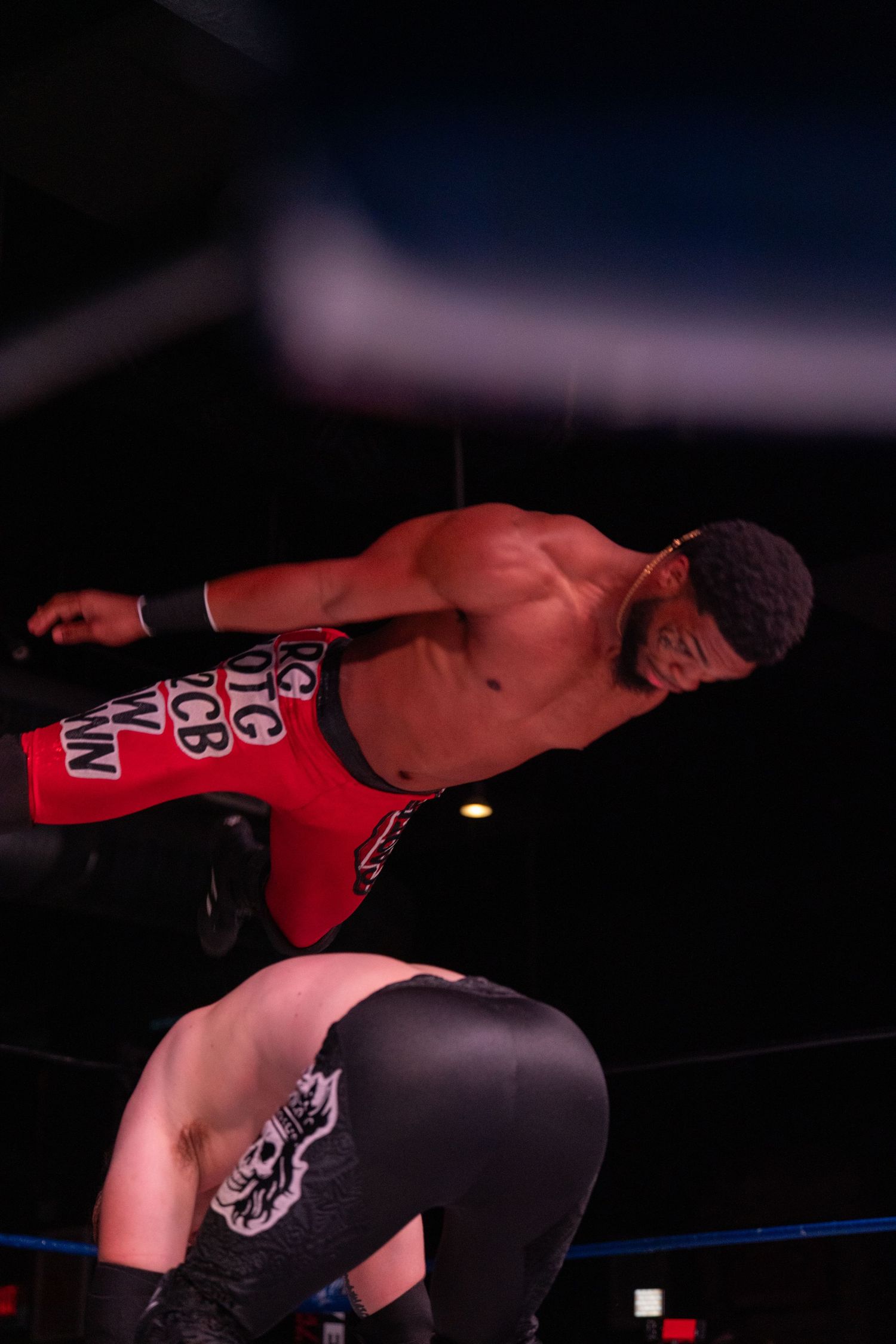 A wrestling move sequence captured in multiple frames shows an athletic display in the ring.