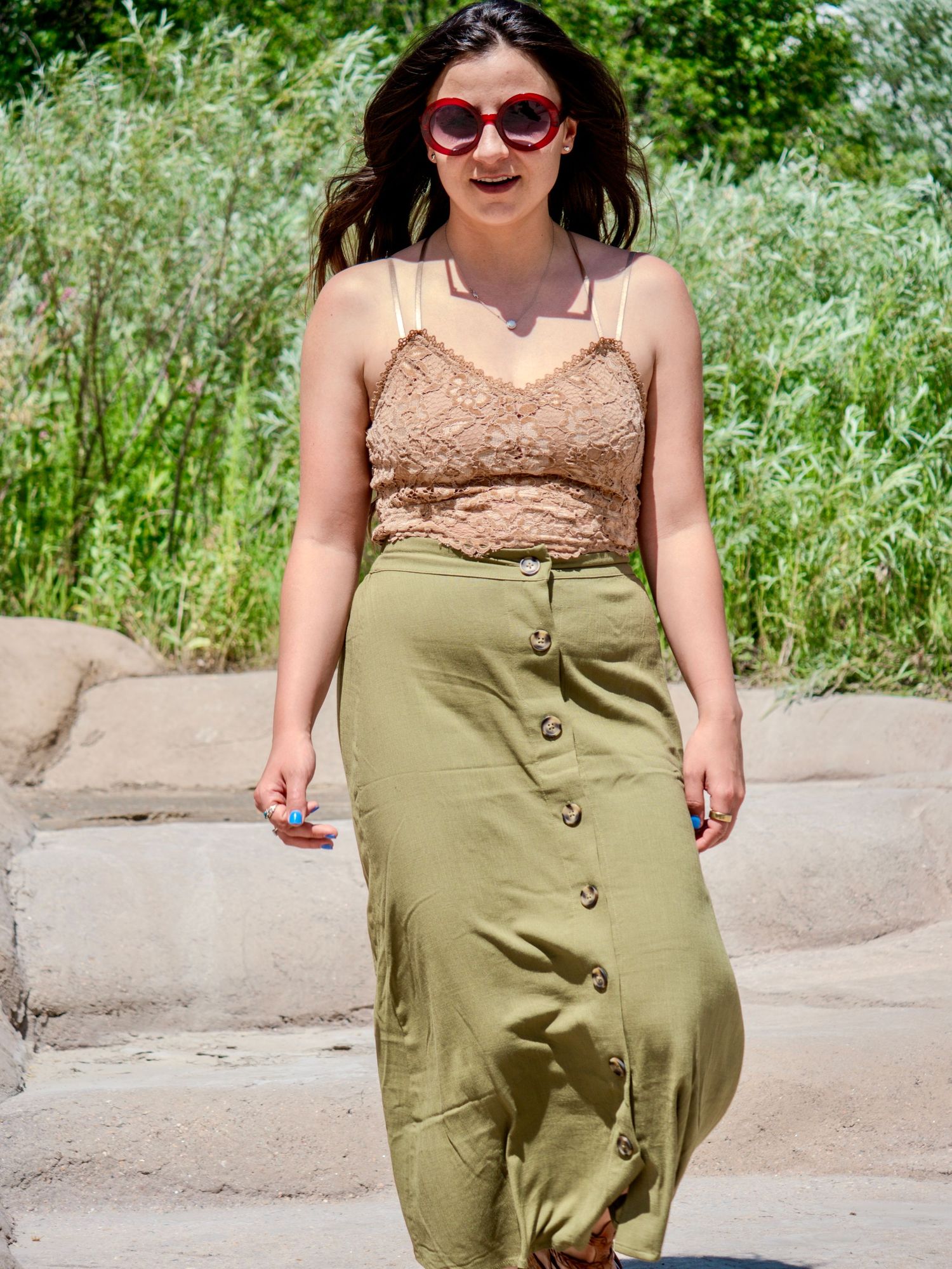 Five fashion detail shots showing a trendy olive green skirt with buttons paired with a lace camisole in summer setting.