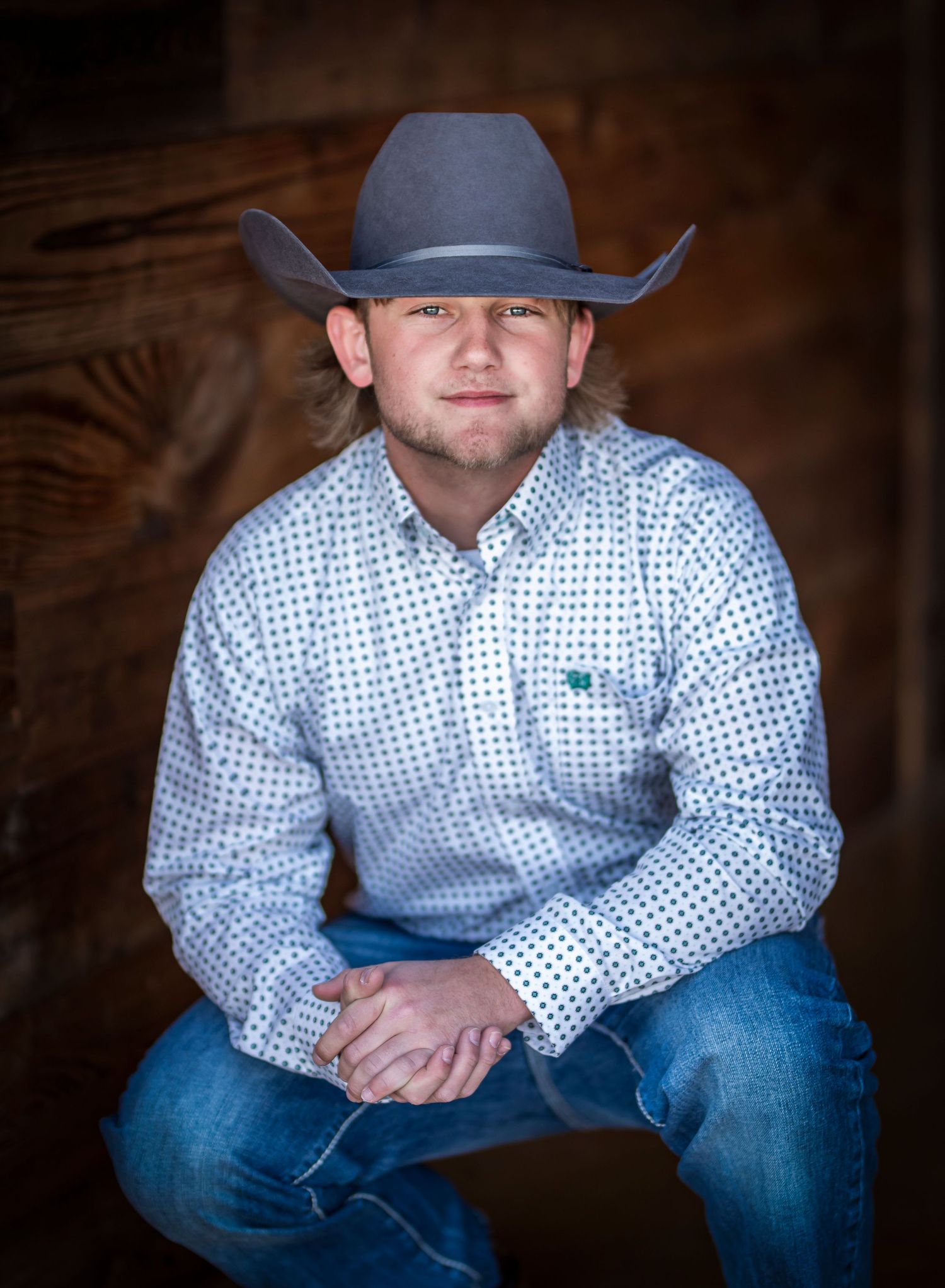 Series showing someone in a white polka dot shirt and cowboy hat sitting in a rustic setting.