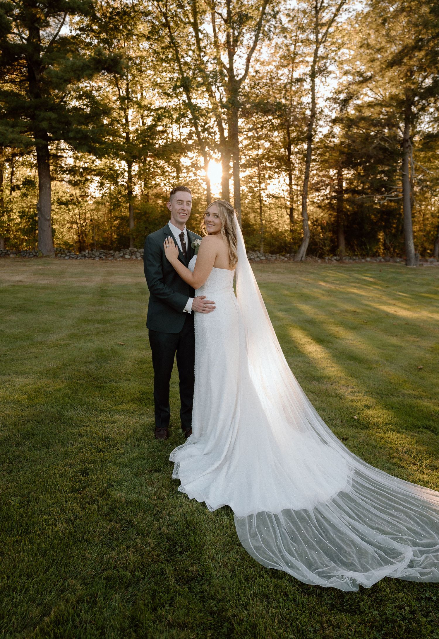 Wedding photography sequence showing couple in natural setting with dramatic flowing veil and sunset lighting.