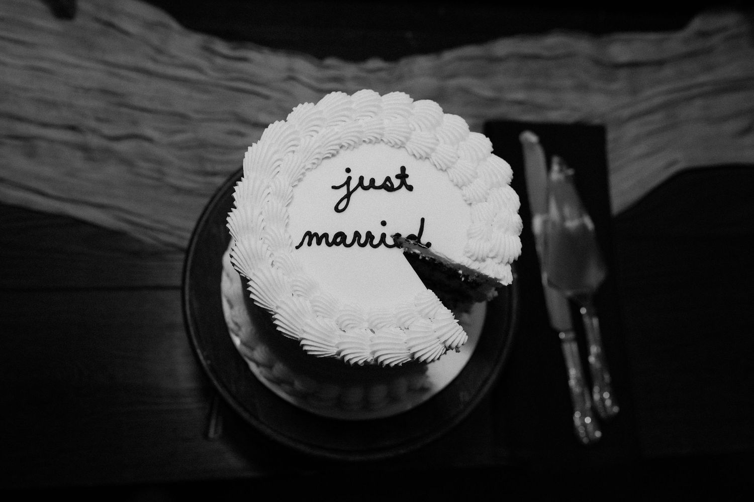 Black and white photos of plates with text written in powdered sugar spelling out 'just married' at a wedding reception.