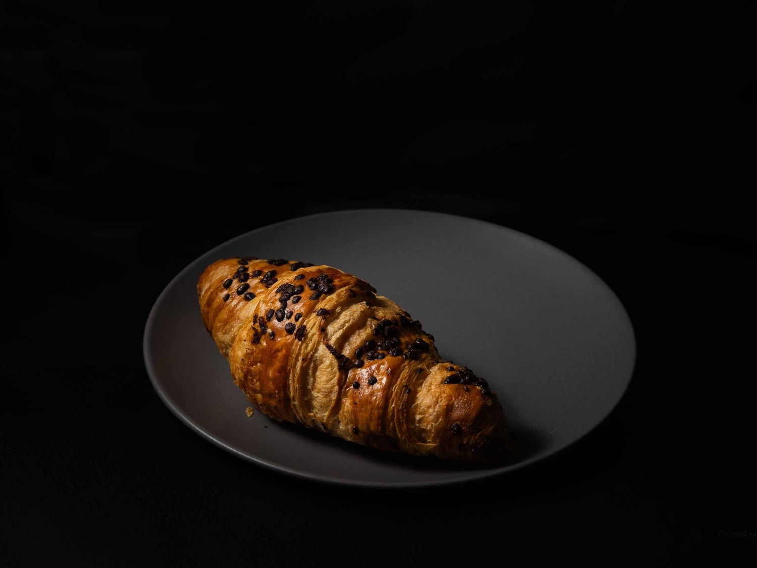genuine croissant from marks and spensers captured under studio lighting by Gerard Su Photography.