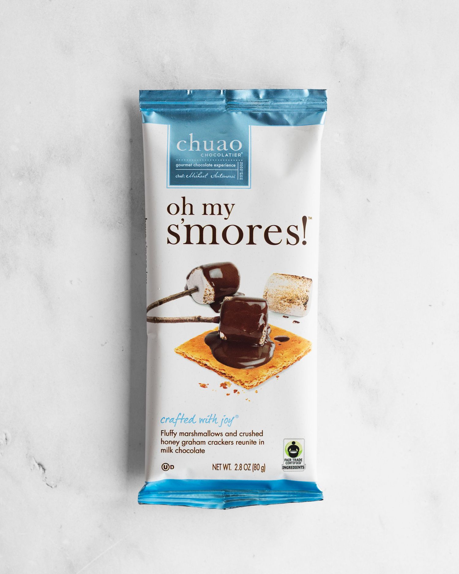 Package of Chuao Smores dark chocolate candy bar set against a light gray background.