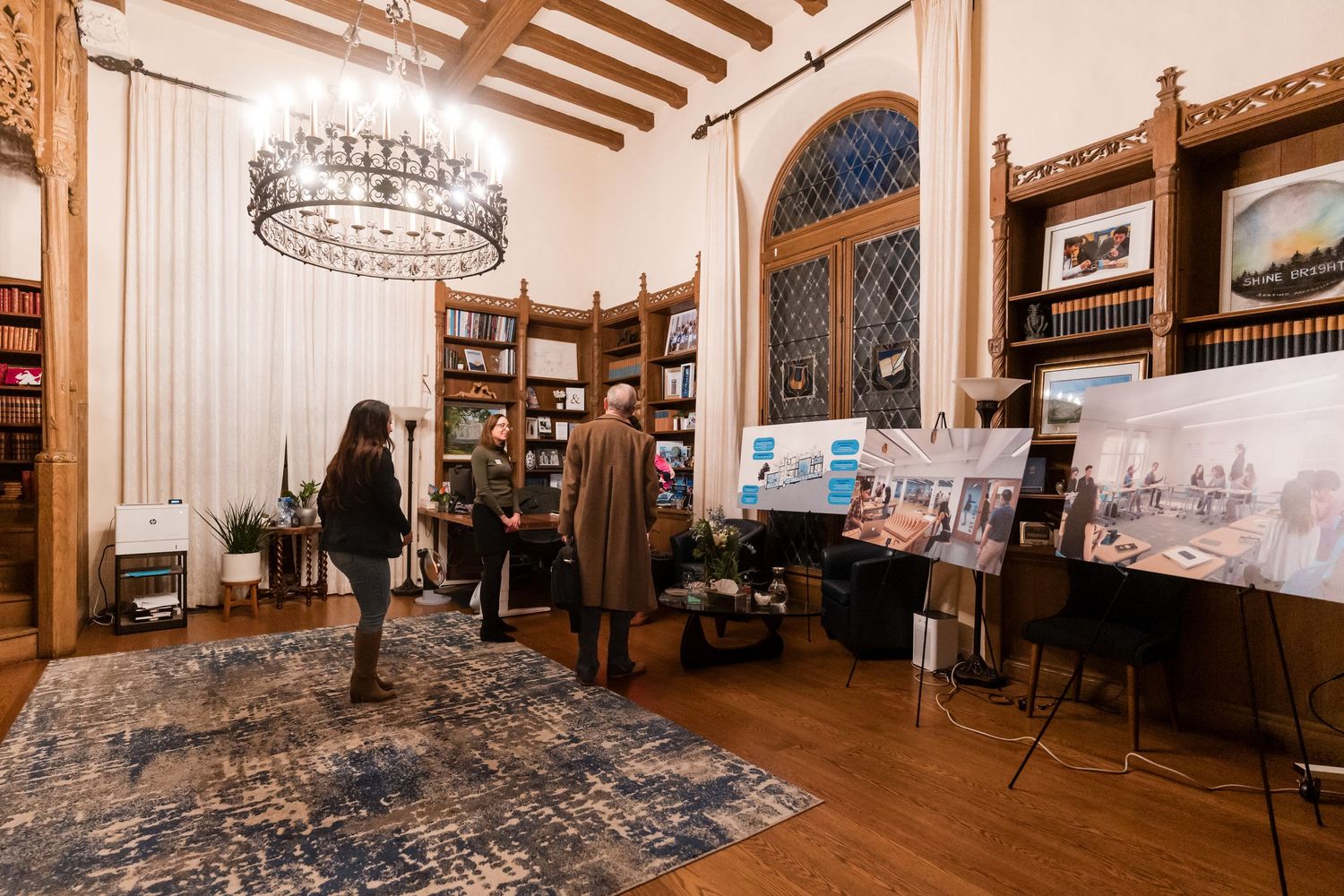 Interior panorama of a historic room with exposed wooden beams and vintage architectural details for event exhibit.