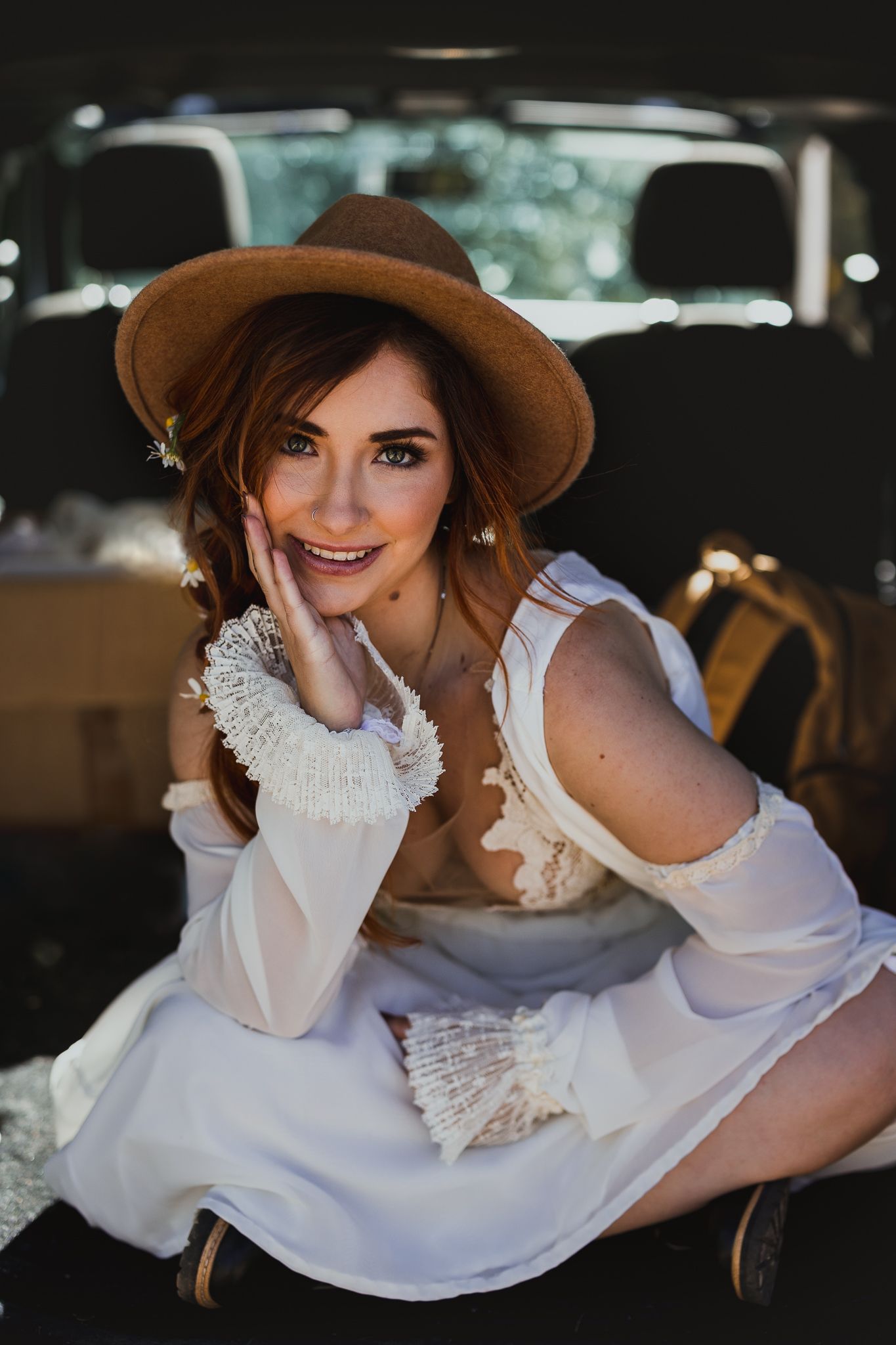 Vintage-inspired portrait series featuring white lace dress and brown hat.