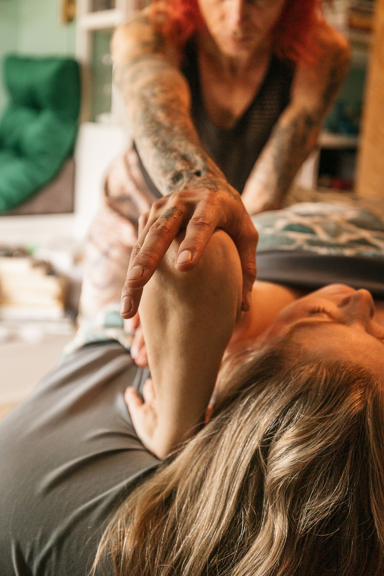 Close-up shots of relaxation therapy or massage treatment session in warm lighting.