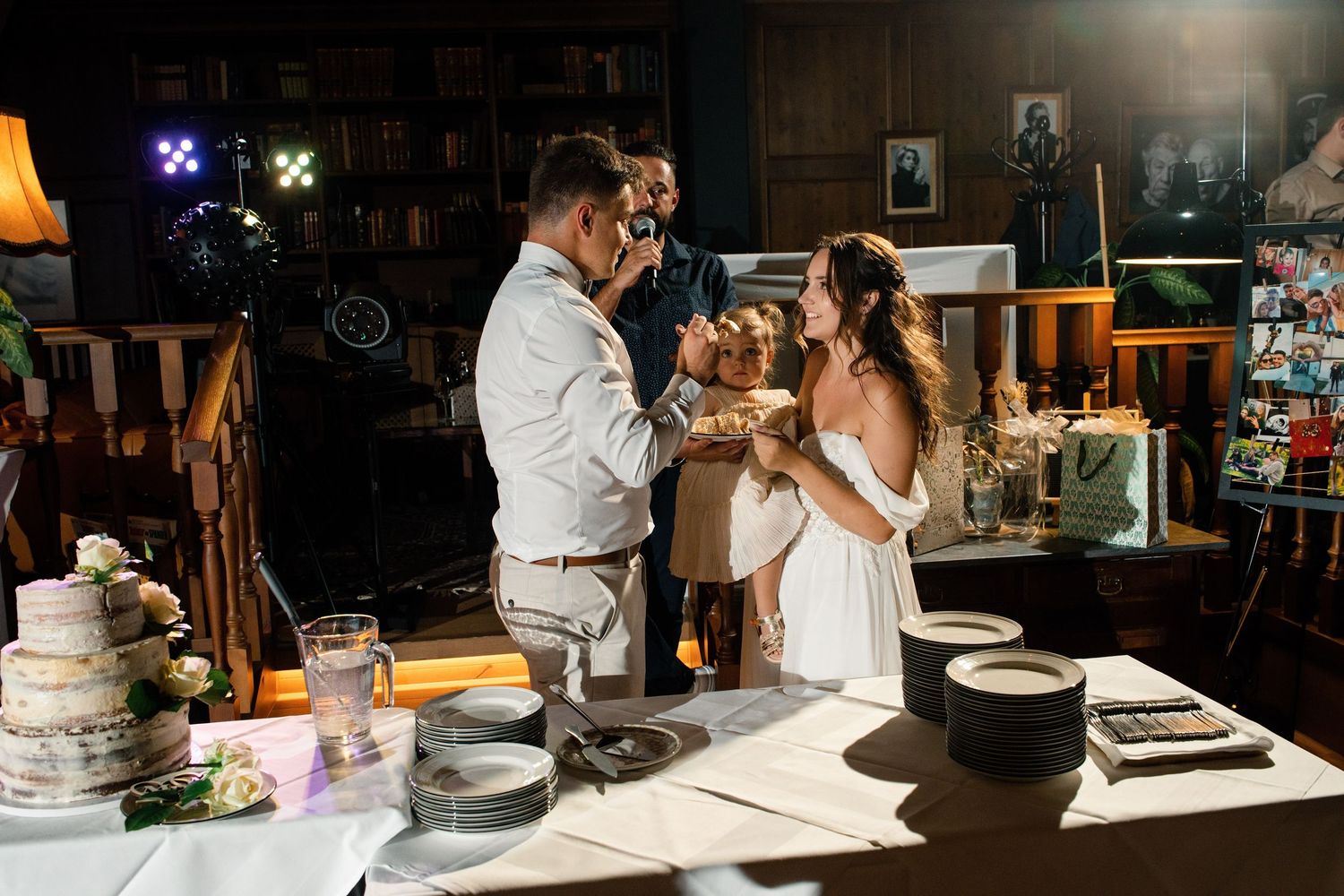 Couple sharing an intimate moment during their wedding cake cutting ceremony.