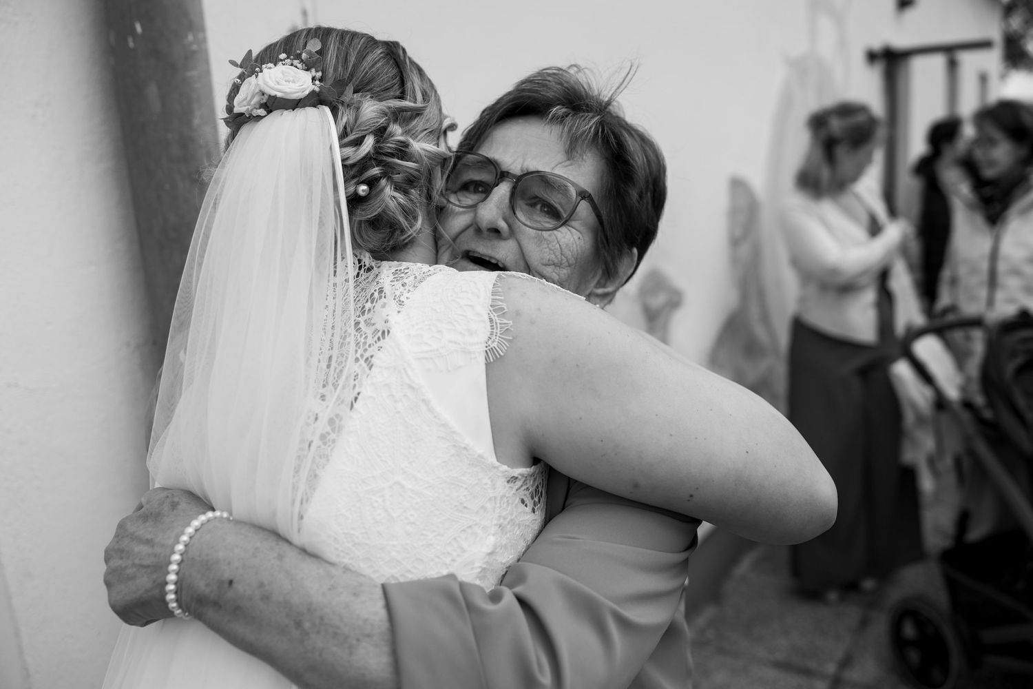 A couple shares an intimate moment during their wedding celebration in a traditional church setting.