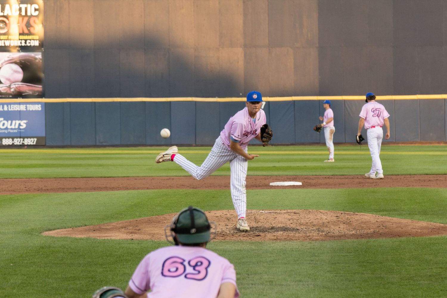 player pitching ball frozem in air