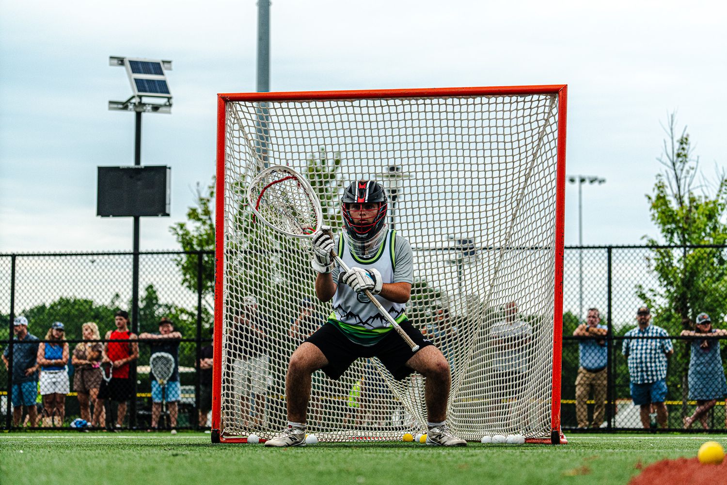 lacrosse player standing in goal