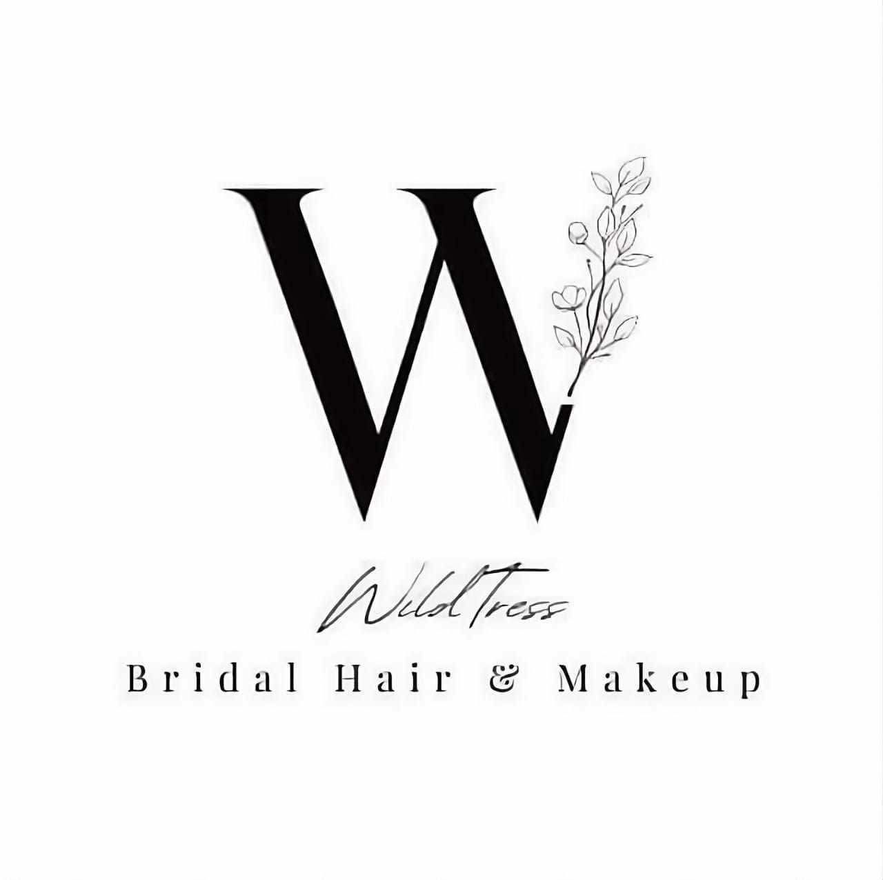 Elegant black letter W logo design with floral accent for bridal hair and makeup services.