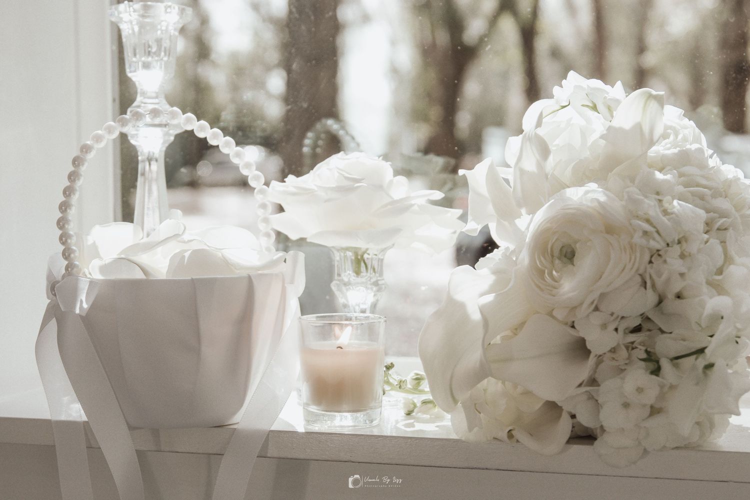Wedding reception table details with white roses and candle at Whitewood Ranch, De Leon Springs FL — Visuals by Lizz