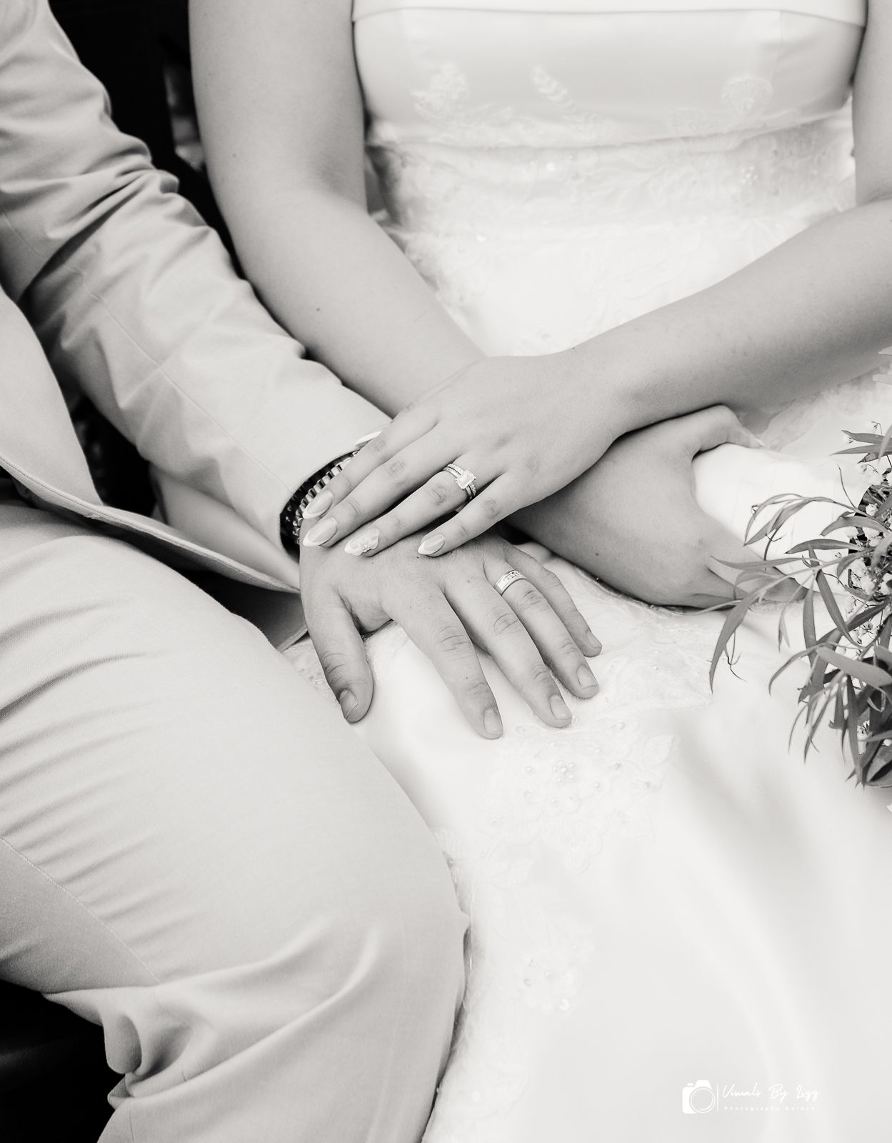 Bride and groom hands with wedding rings at McKee Botanical Garden wedding, Vero Beach FL — Visuals by Lizz