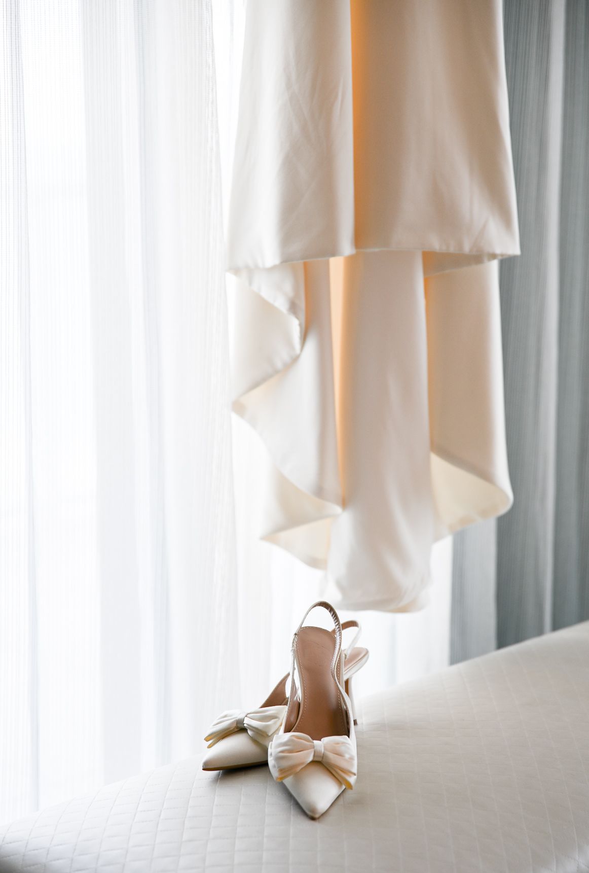 Wedding dress and bridal heels detail at Oceanfront at Windmill Events, Jensen Beach FL Visuals by Lizz, Treasure Coast wedding photograph