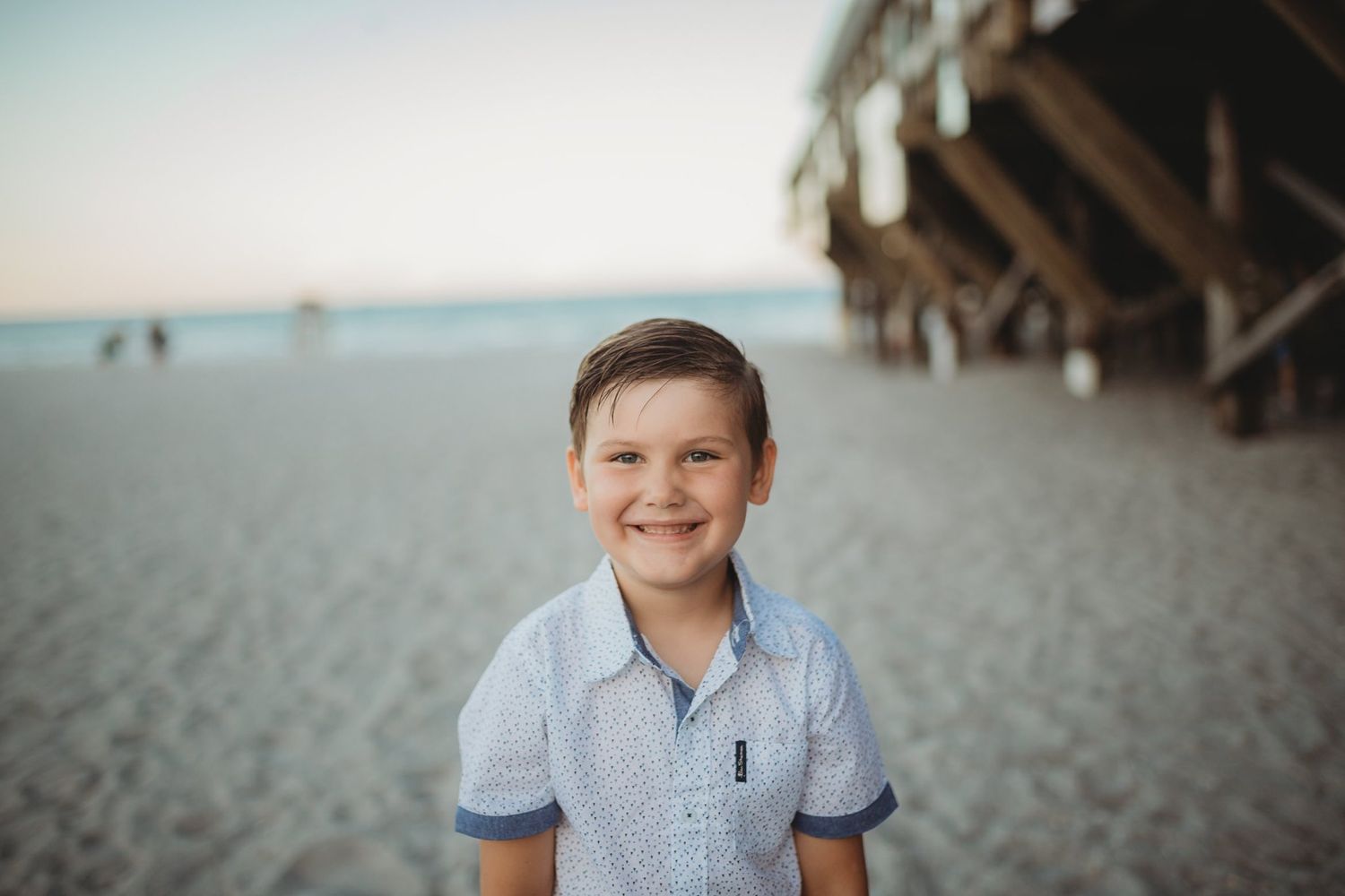 Child smiling during Lawrence Kansas family photography session